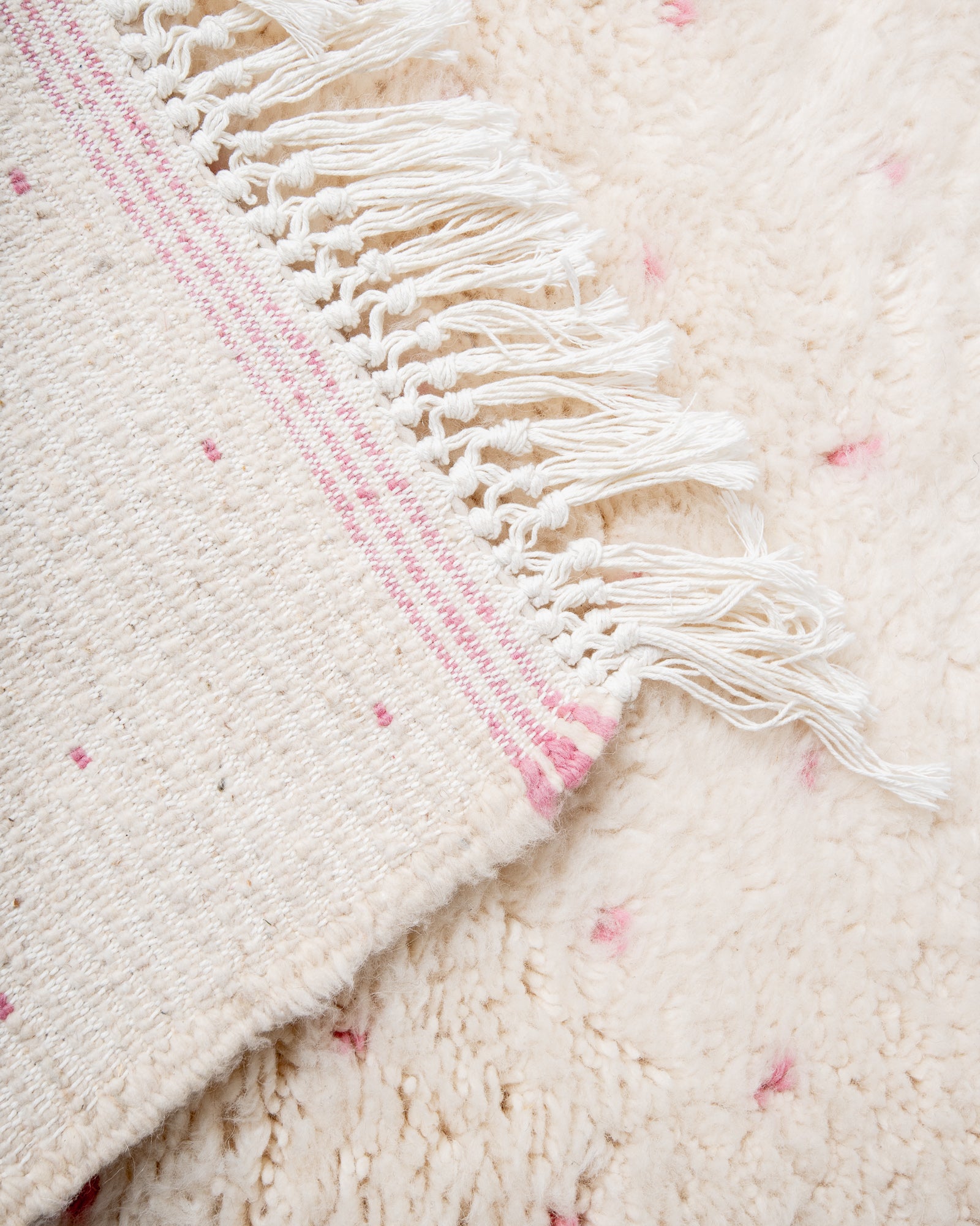 Modern, designer, handcrafted Berber rug from Morocco. Beniourain carpet with beautiful colours and patterns and fluffy wool texture.